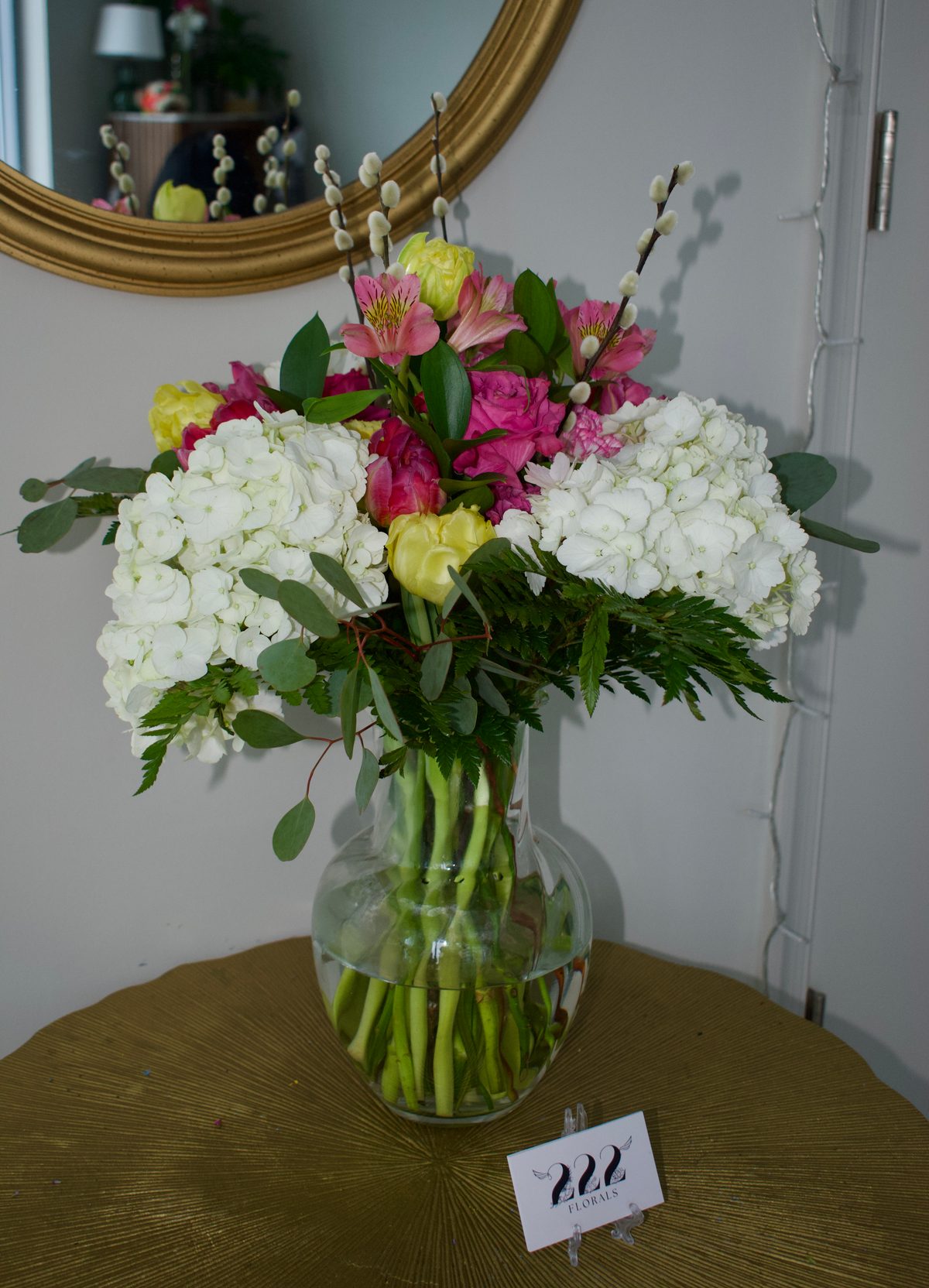 White hydrangeas with pink accents and pussy willows